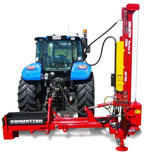 Expander Telescoping mast post driver mounted to rear of New Holland tractor